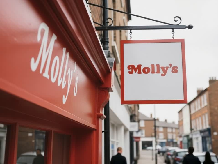 Red storefront with 'Molly's' sign on a city street